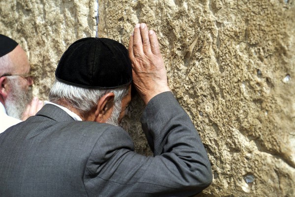 Jewish man_Kotel_prayer_Herodian stone_Jerusalem_kippah