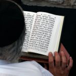 Man-Praying-Siddur-Tehillim-Psalms