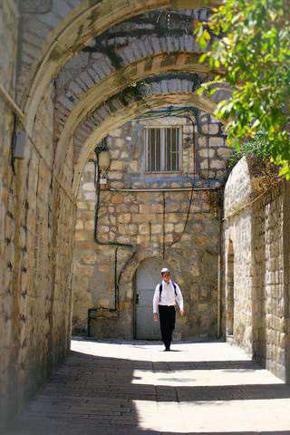 Religious Jew-Walks-Street-Old City-Jerusalem