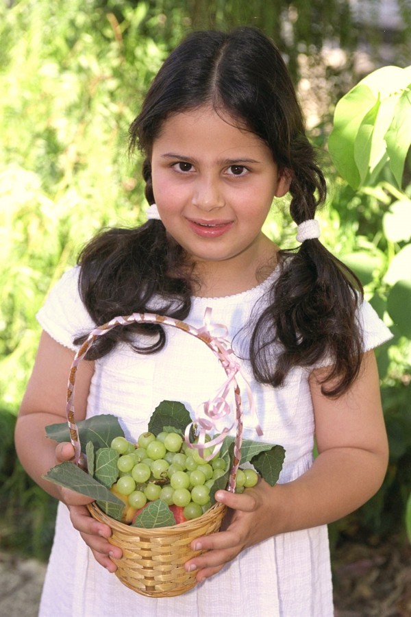 Israeli girl-basket of grapes