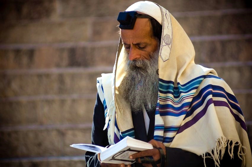 Orthodox Jewish man in prayer-tallit-tefillin