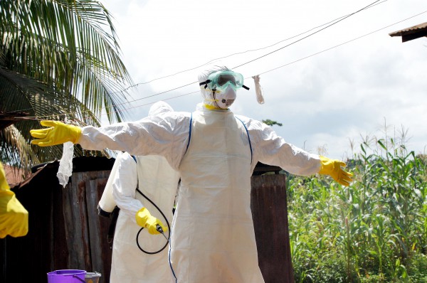 Health care workers suit up in protective gear to prevent the spread of Ebola