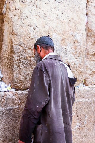 homeless man-Israel-prays-Western (Wailing) Wall-Jerusalem.