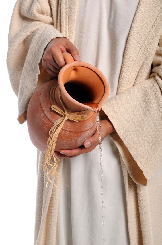 Hands of Jesus pouring water from Jar 