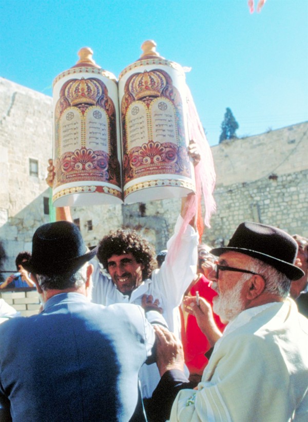 Lifting the Torah for all to see at the Western (Wailing) Wall in the Old City of Jerusalem. (Photo: Israel Ministry of Tourism)