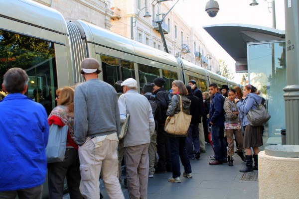 A crowded light rail station in Jerusalem.