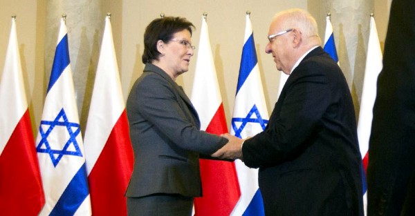 Polish Prime Minister Ewa Kopacz greets Israeli President Reuven Rivlin.