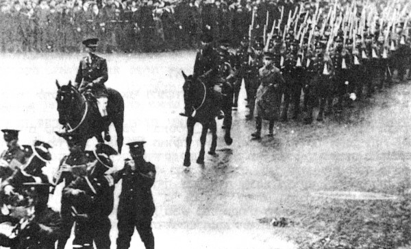 The 38th Royal Fusiliers march on Whitechapel Road in London.