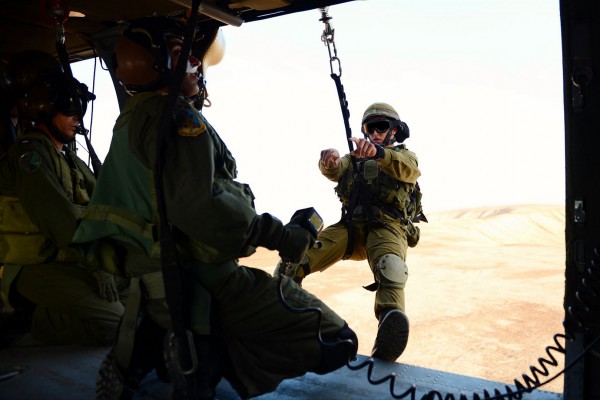 IDF’s Nahal Brigade and elite rescuers from the Airborne Rescue and Evacuation Unit 669 soldiers embark on a helicopter mission exercise. (IDF photo by Pvt. Alexi Rosenfeld)