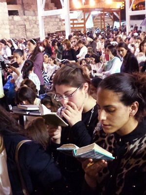 Jewish women pray in the Women's Section of the Western Wall.