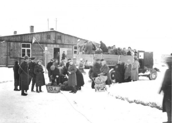 Former prisoners, patients of Soviet field hospital, leave the site of the camp after convalescence.