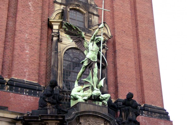 A sculpture of an angel warring with a demon at a church in Hamburg, Germany. (Photo by Alvaro Guzman)