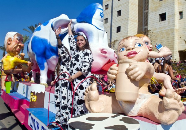 Tel Aviv-Purim Parade in Holon-Israel-Netanyahu milks cow-babies