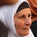 Palestinian woman sheds a tear