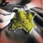 old photograph of sewing on a Jewish star