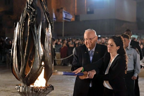 Israeli President Reuven Rivlin lights the official Yom HaZikaron torch on Memorial Day.