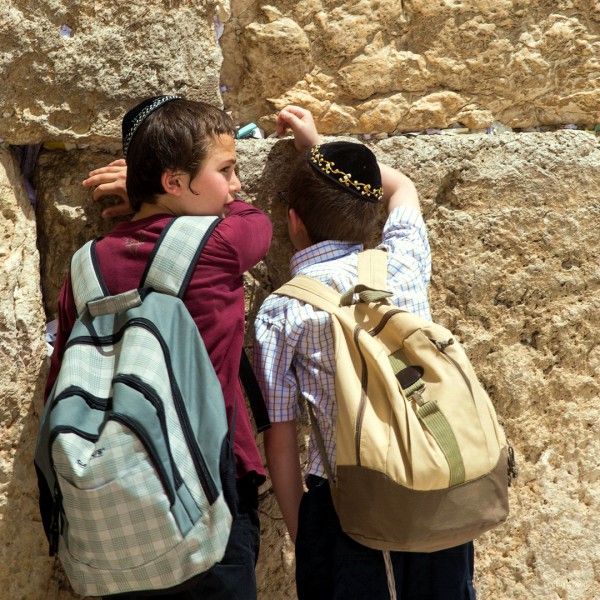 Jewish boys pray at the Western (Wailing) Wall in Jerusalem.