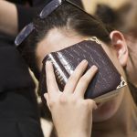 A Jewish woman buries her face in her siddur (prayer book) as she prays at the Western (Wailing) Wall in Jerusalem.