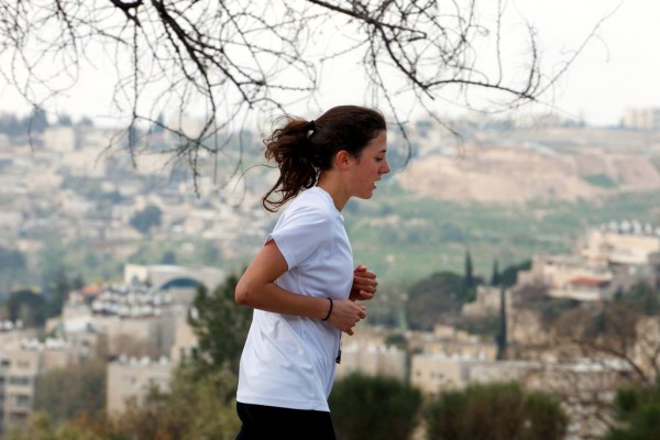 A woman runs in the Jerusalem Marathon