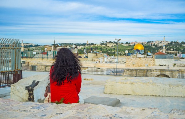 woman overlooks jerusalem